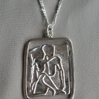 female nude pendant